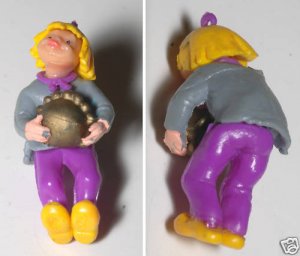 VINTAGE CHARACTER RUBBER PLASTIC PENDANT GIRL CARRYING