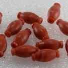Vintage set of 12 Plastic Orange White Barrel Beads