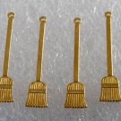 Vintage Set of 4 Brass Broom Sweeping STamping Pendant  Jewelry Making