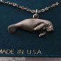 Vintage Made in USA Manatee Necklace Silver Metal New On Card Jewelry
