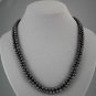 Single Strand 6.5-7.5mm black pearls, 46"" necklace