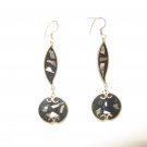 Black earrings with abalone shell accents