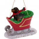 SLD124 Wire Haired Dachshund Sleigh Ride Ornament