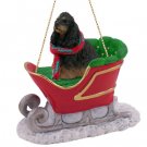 SLD15F Cocker Spaniel, Black & Tan Sleigh Ride Ornament