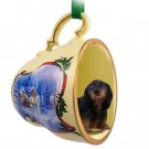STCD60B Dachshund, Longhaired, Black Sleigh Ride Holiday Tea Cup Ornament