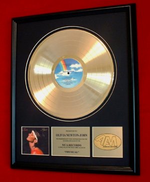 OLIVIA NEWTON-JOHN GOLD RECORD AWARD "PHYSICAL"