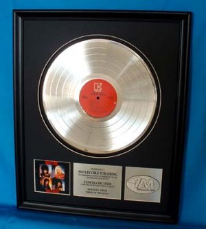 MOTLEY CRUE PLATINUM RECORD AWARD "SHOUT AT THE DEVIL"