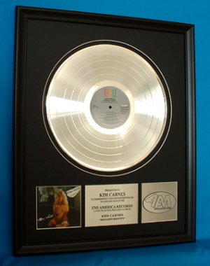 KIM CARNES PLATINUM RECORD AWARD "MISTAKEN IDENTITY"