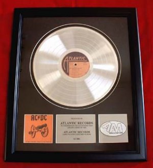 AC/DC PLATINUM RECORD AWARD "FOR THOSE ABOUT TO ROCK"