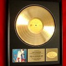 MICK JAGGER GOLD RECORD AWARD "UNDERCOVER" - THE ROLLING STONES MICK JAGGER GOLD RECORD AWARD "UNDERCOVER" - THE ROLLING STONES