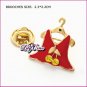 Lady Skirt Brooch, Brooches