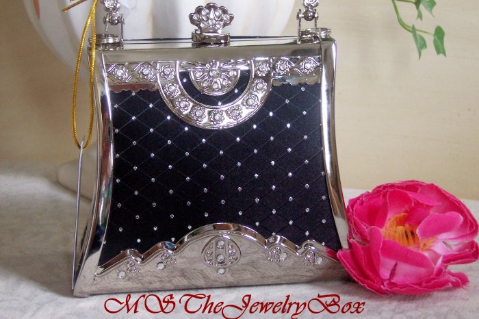 black & silver clutch bag