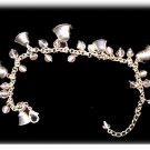 Lovely Avon Silvertone Bell & Clear Glass Bracelet
