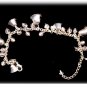 Lovely Avon Silvertone Bell & Clear Glass Bracelet