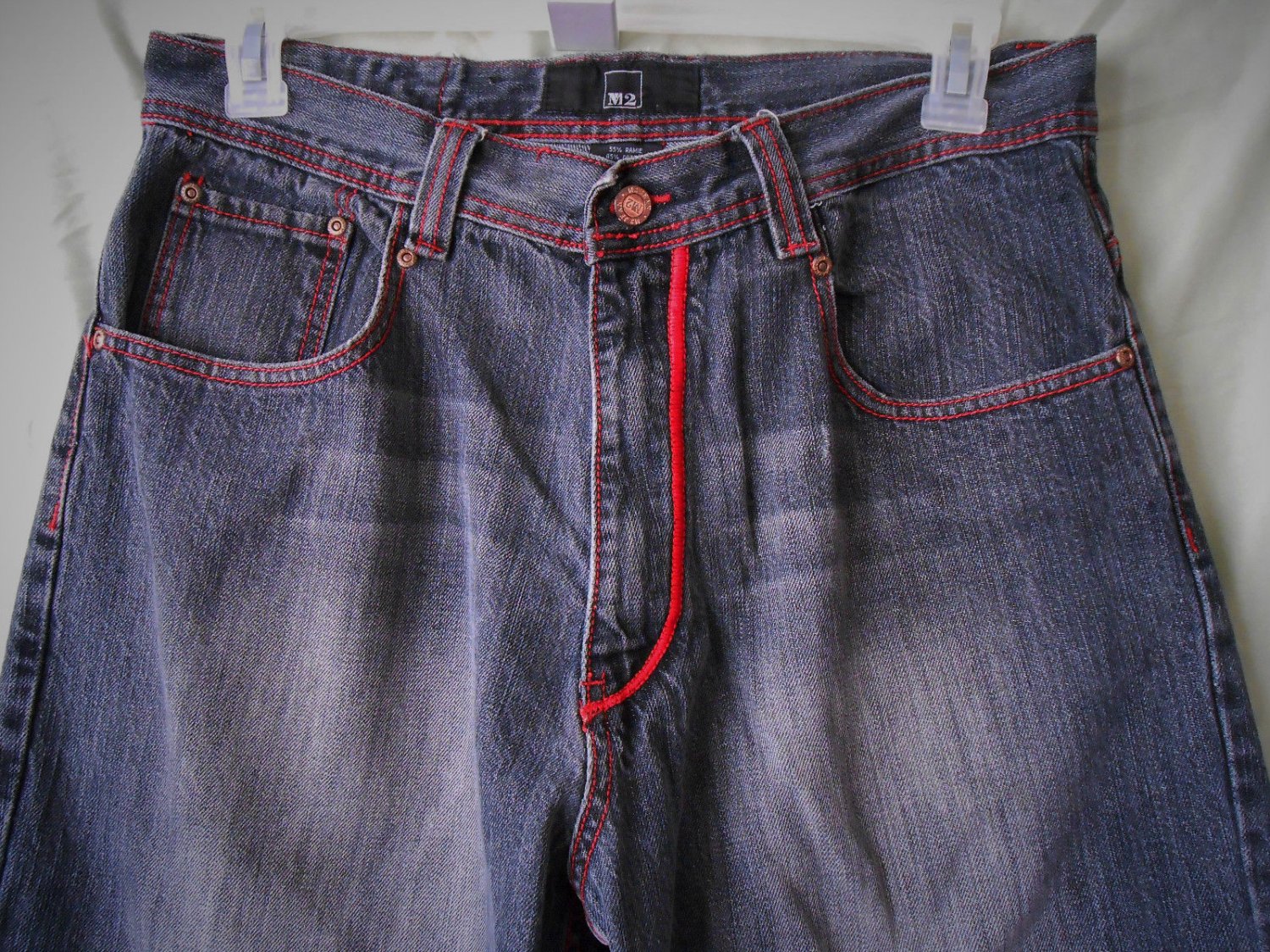 black jeans with red stitching