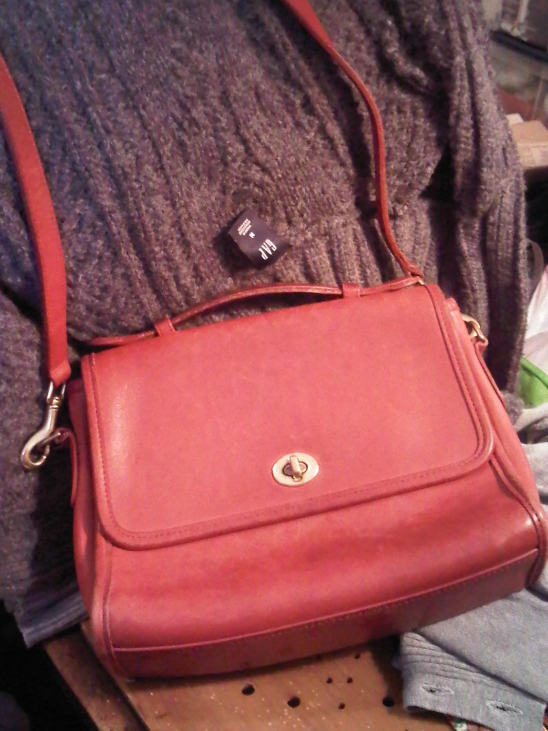 brown and red coach bag