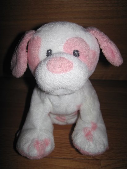 pink and white stuffed dog