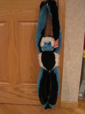 stuffed monkey with velcro hands and feet