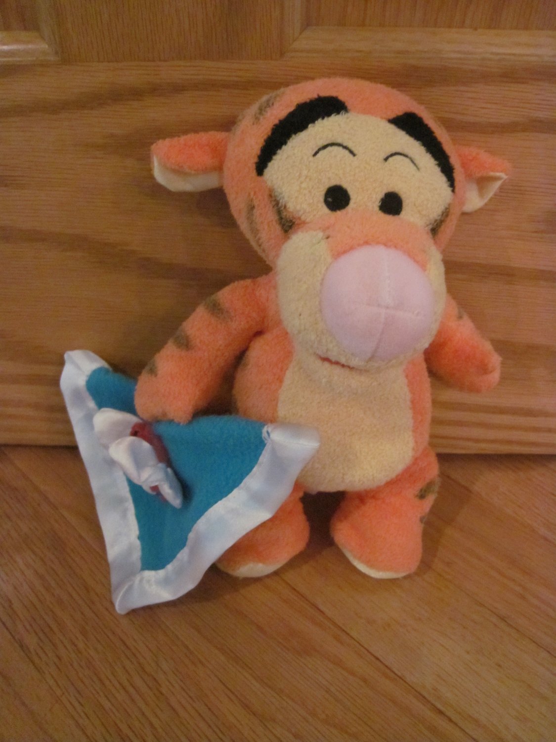 Disney Winnie the Pooh Tigger the Tiger Plush Rattle Holding Blue