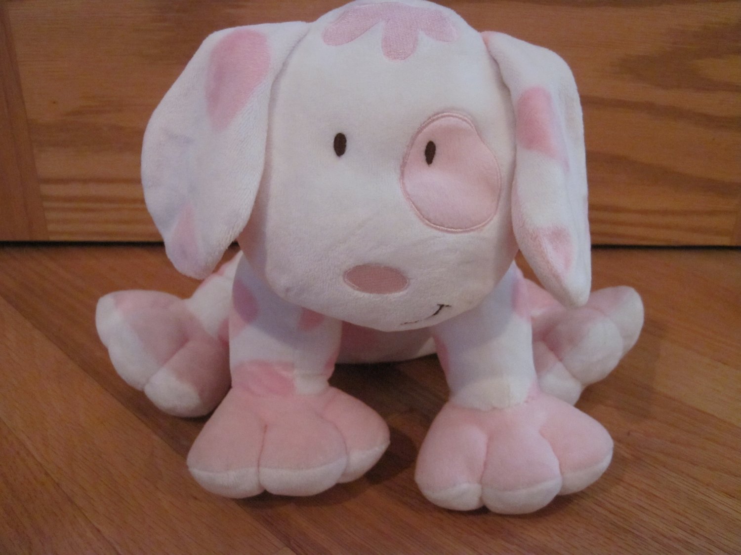 pink and white stuffed dog