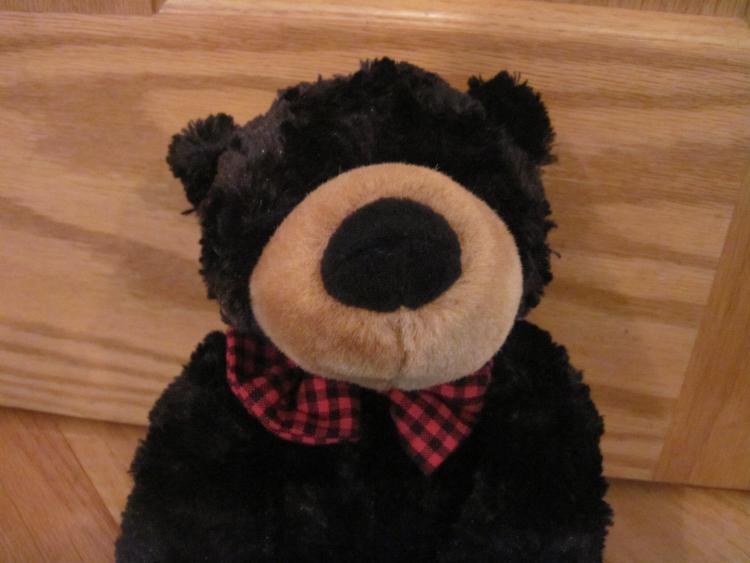 teddy bear with black bow tie