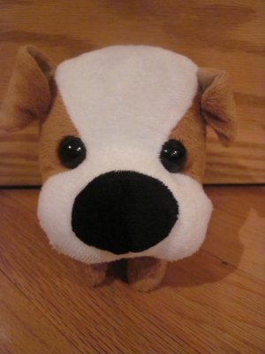 dog with big head and small body stuffed animal