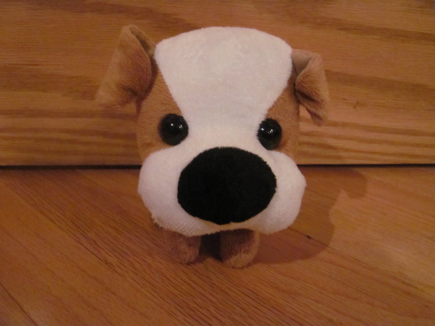 dog with big head and small body stuffed animal