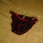 Black panties with red ruffly piping