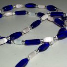 Cobalt Blue and Ivory Beaded Opera Necklace Charming Elegant Stylish Trendy Mod Chic Glass Beads