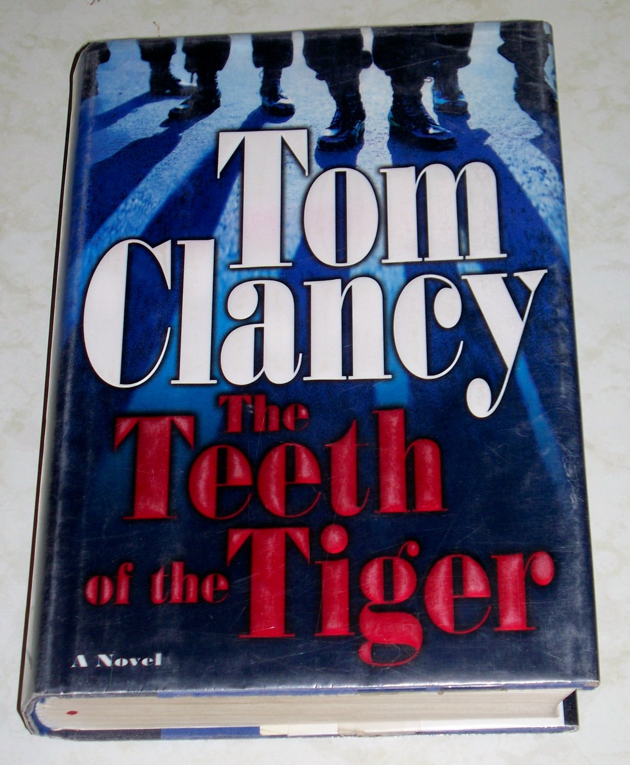 The Teeth of the Tiger by Tom Clancy (ex-library)