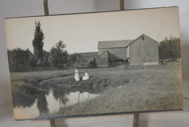 VELOX postcard 1907-1917 big barn 2 women at a pond