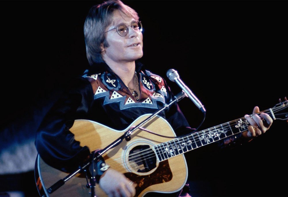 john denver playing 12 string guitar