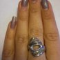 Sterling silver marked ring with gold braids!