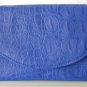 blue embossed leather clutch