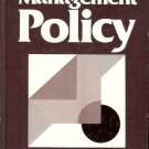 MANAGEMENT POLICY MELVIN J. STANFORD