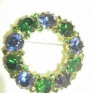 Karu signed wreath brooch green and blue Rhinestone
