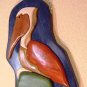 Pelican Pete â Mosaic Relief Carving