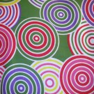 1 yard - Green flannel concentric circle design - red, green, pink, yellow, purple