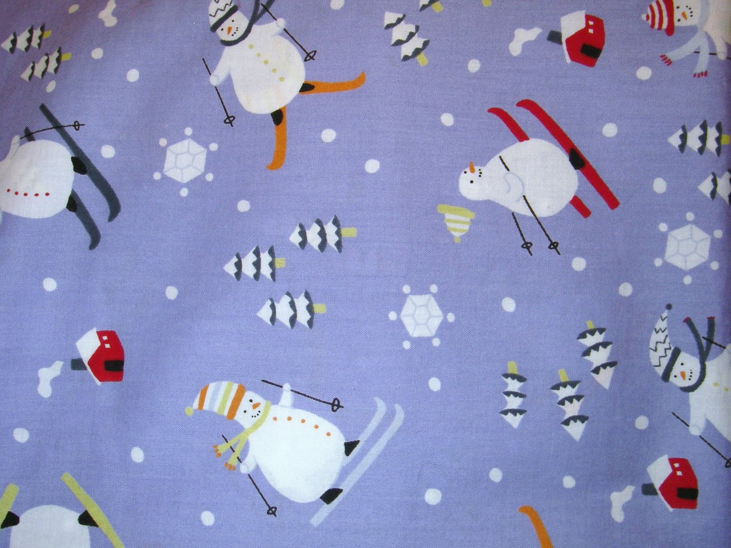 1 yard - Purple fabric with skiing snowmen all over, houses, trees, snowflakes