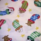 7/8 yard - Off white fabric with holiday characters in stockings with stars tossed all over
