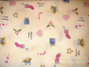 1.875 yards - Cream colored background with small holiday items all over fabric
