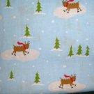 1.8 yard - Skating Reindeer - Light blue fabric, trees, red, green, white, brown