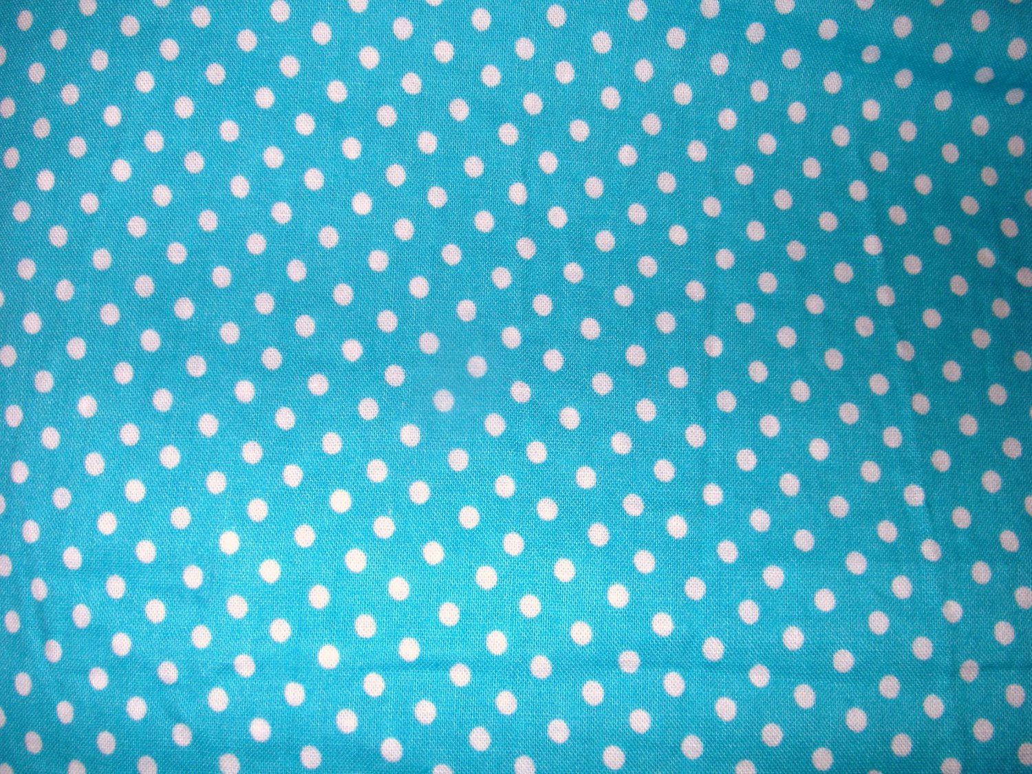 1.33 yards - Bright blue fabric with circles and shapes