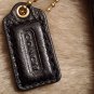 Brand New Coach classic black wristlet