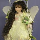 Beautiful Fairy Doll on Swing dressed in Yellow