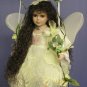 Beautiful Fairy Doll on Swing dressed in Yellow