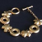 Vintage XOXO Gold Tone Toggle Clasp Bracelet