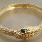 Vintage Gold Tone Snake Green Eye Hinged Bracelet