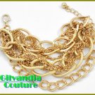 A gorgeous fashion bracelet with tons of goldtone and layers of textured chains.
