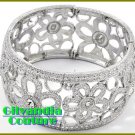 A stretch boutique bracelet that flaunts a beautiful filigree flower theme.